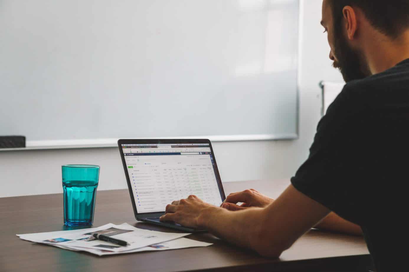 Person setting up doing digital marketing & setting up Facebook Ads.