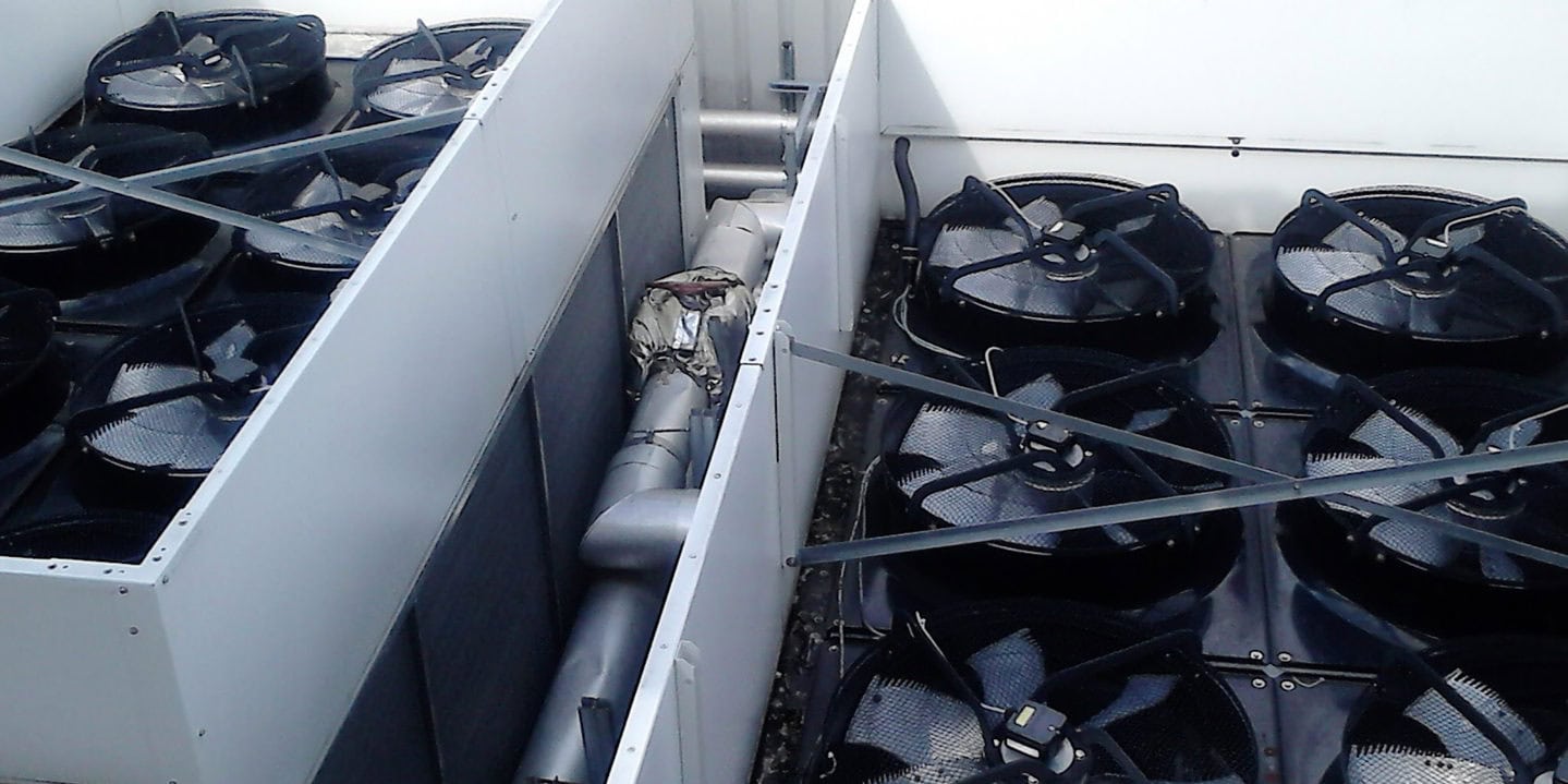 Packaged chiller service maintenance and repair showing the top of the chiller fan decks