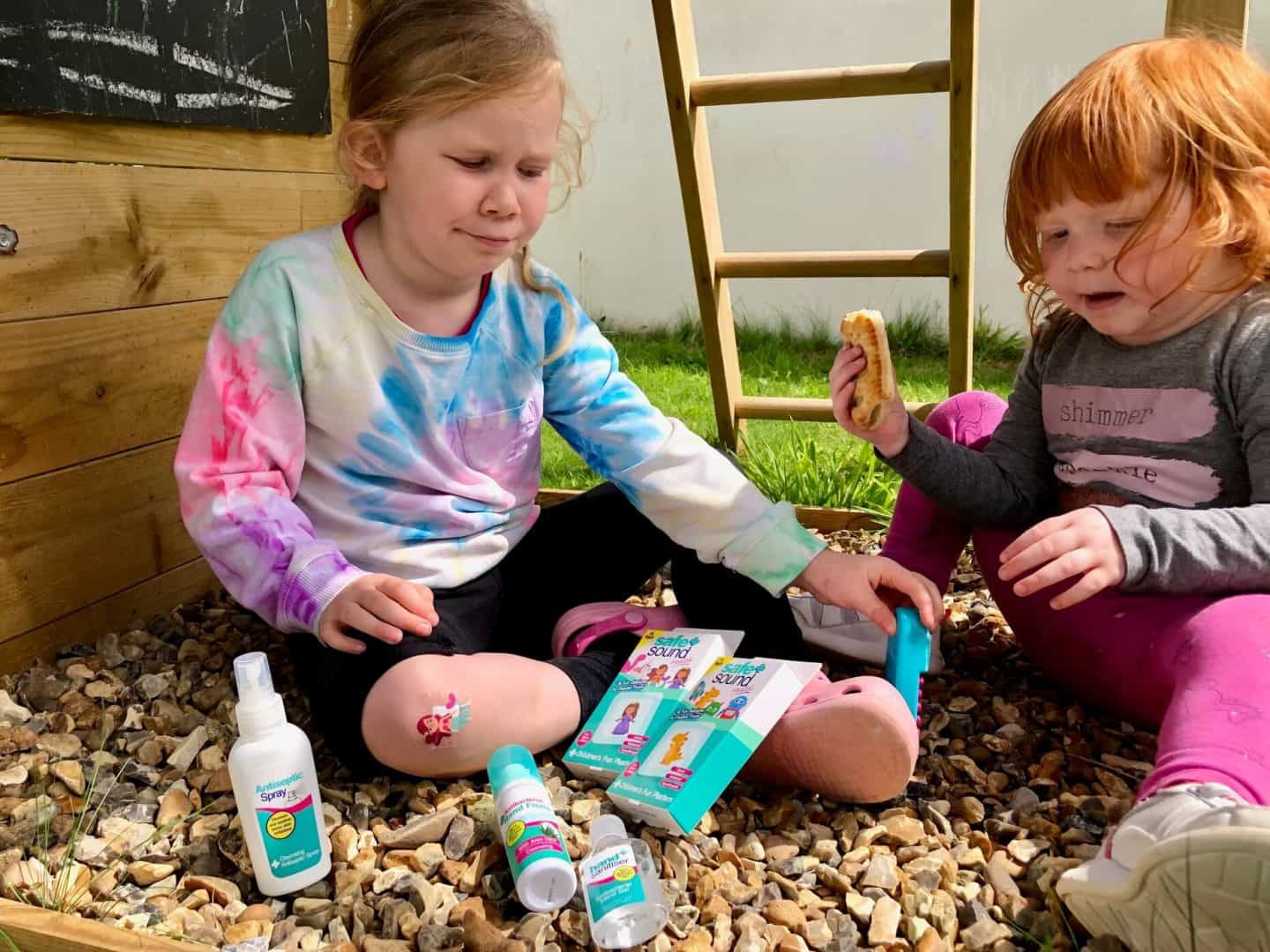 L with a plaster on her knee - Top Tips Packing a First Aid Kit For Outdoor Adventures With The Kids