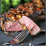 Mongolian Glazed Grilled Steak has a thin, crispy coating and a tangy barbecue glaze. #steak #beef #beefitswhatsfordinner #grilling #recipe #dinnerideas