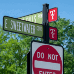 decorative street signage on a neighborhood road