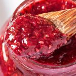 Closeup Strawberry Chia Jam in Jar with spoon