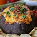 Looking for the perfect cheesy party dip? Well, look no further. This Bacon Cheddar Bread Bowl Dip is the perfect way to get the party started. #HeluvaGoodSummer #Ad #IC