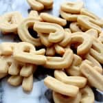 Pile of letter cookies on a marble board