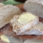 Irish brown bread on wooden cutting board