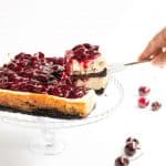 Chocolate Chip Cherry Cheesecake. A fresh sweet cherry sauce tops this easy to make cheesecake. A super fudgy cookie crust takes it over the top!