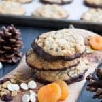 Pistachio Bark Oatmeal Cookies. Chewy oatmeal cookies filled with pistachios, cranberries, white chocolate and apricots then dipped in dark chocolate!