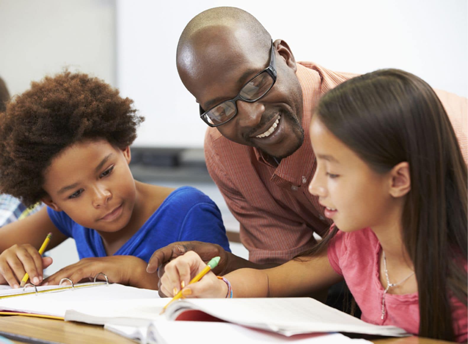 School-occupational-therapy teacher working with students