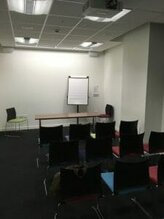 Initial presentation se-up with a "Presenters' Table" at the front