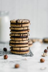 Hazelnut Espresso Sandwich Cookies: a perfect treat of sinful chocolate ganache sandwiched between two hazelnut espresso cookies.