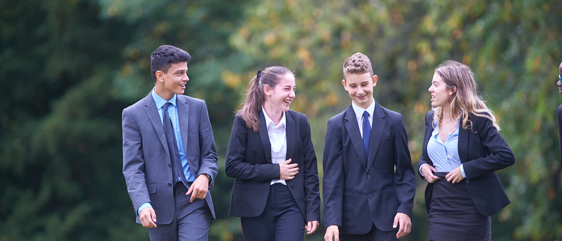 Two boys and two girls walking together