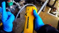 Gas leak detector being used in a home