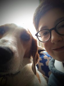 A photo of Jake and their dog Maddie.