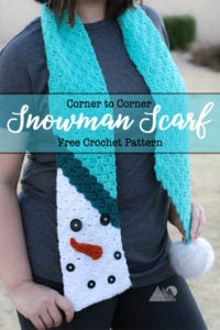 C2C Snowman Scarf is a beautiful fun and creative way to create a fun scarf using the corner to corner crochet technique. Follow this free crochet pattern to create a whimsical crochet scarf. with a snowman motif. #crochetscarf #crochetpattern
