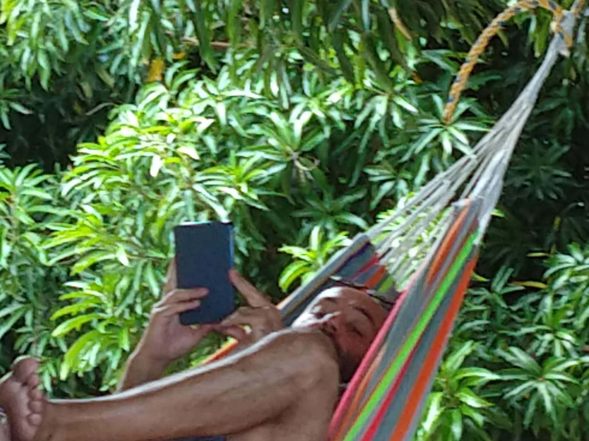 Our Two Wonderful Nights in Minca, Colombia 9 Joe enjoying a hammock and reading on his kindle