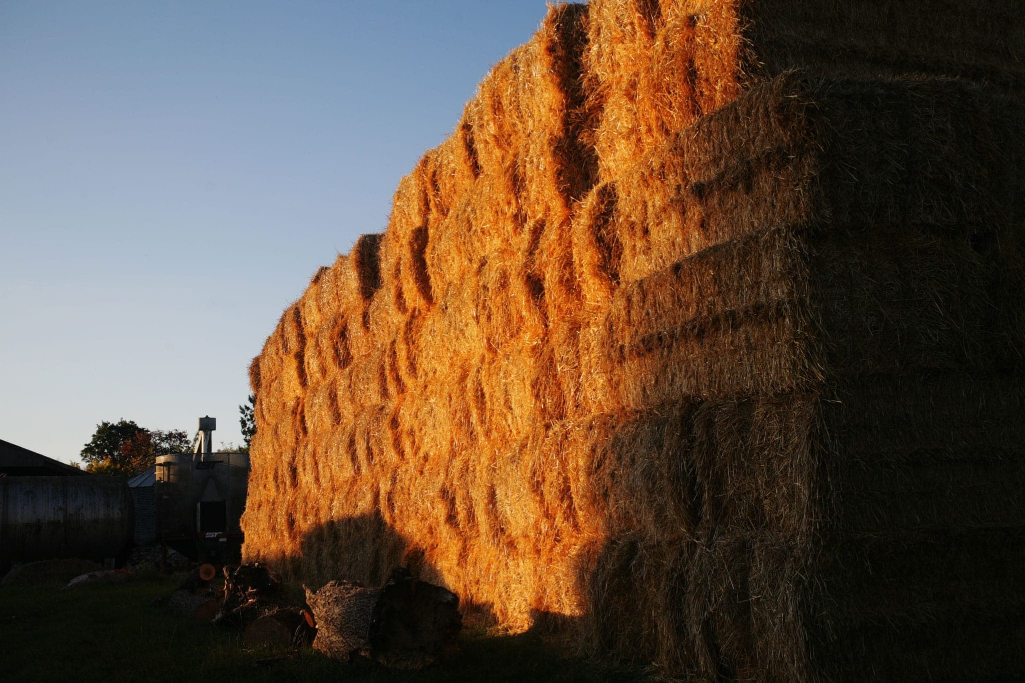 Hay bales at sunset