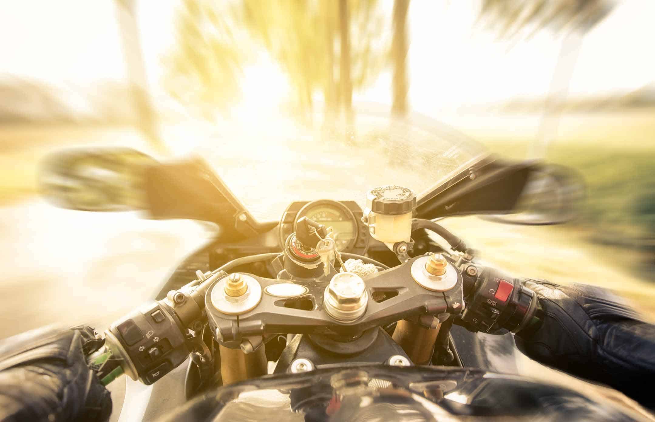 view from a motorcycle driver on a sunny day