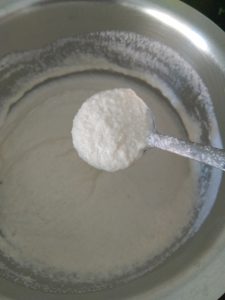 Adding water to adjust idli batter consistency