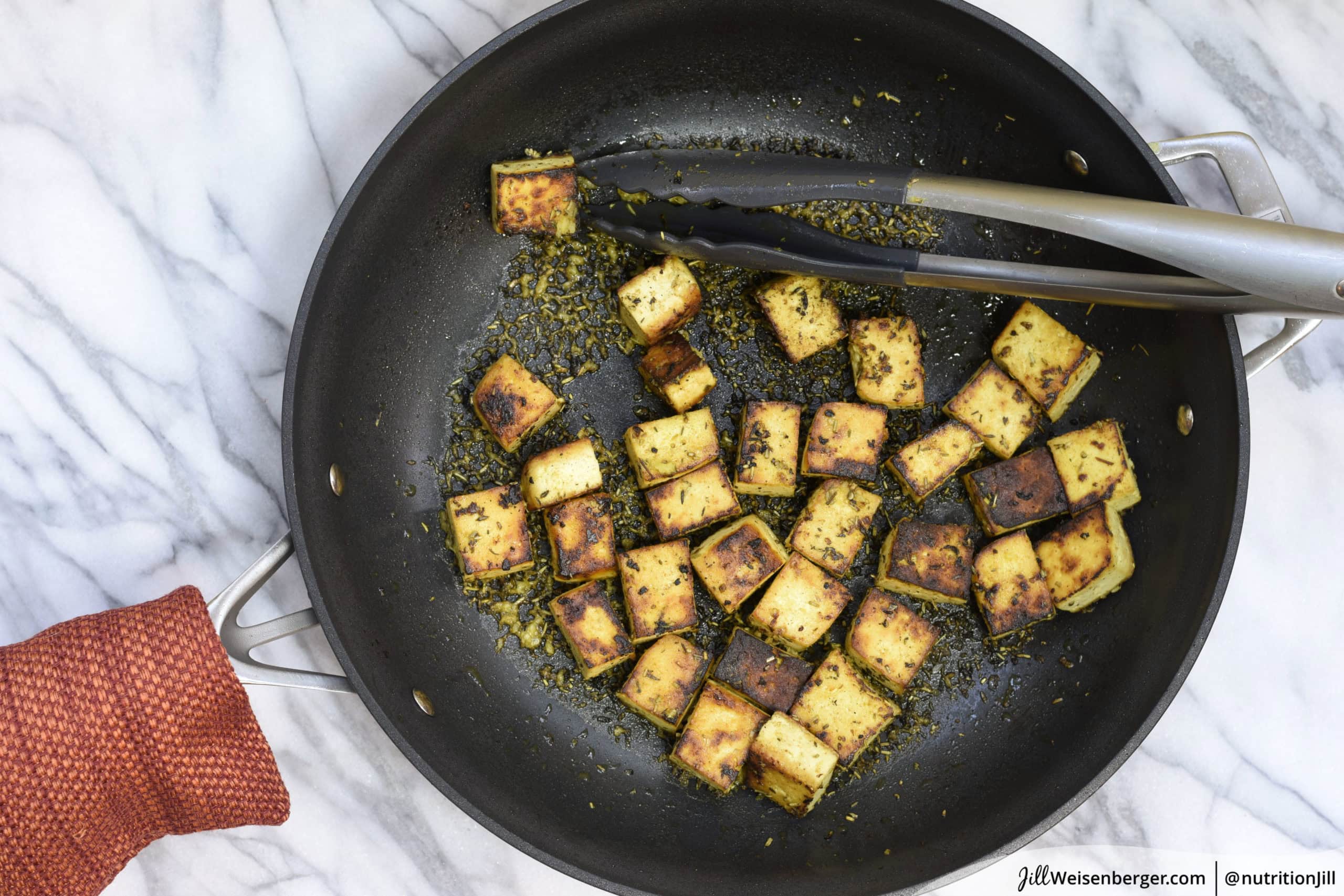 marinated tofu cooked in a skillet
