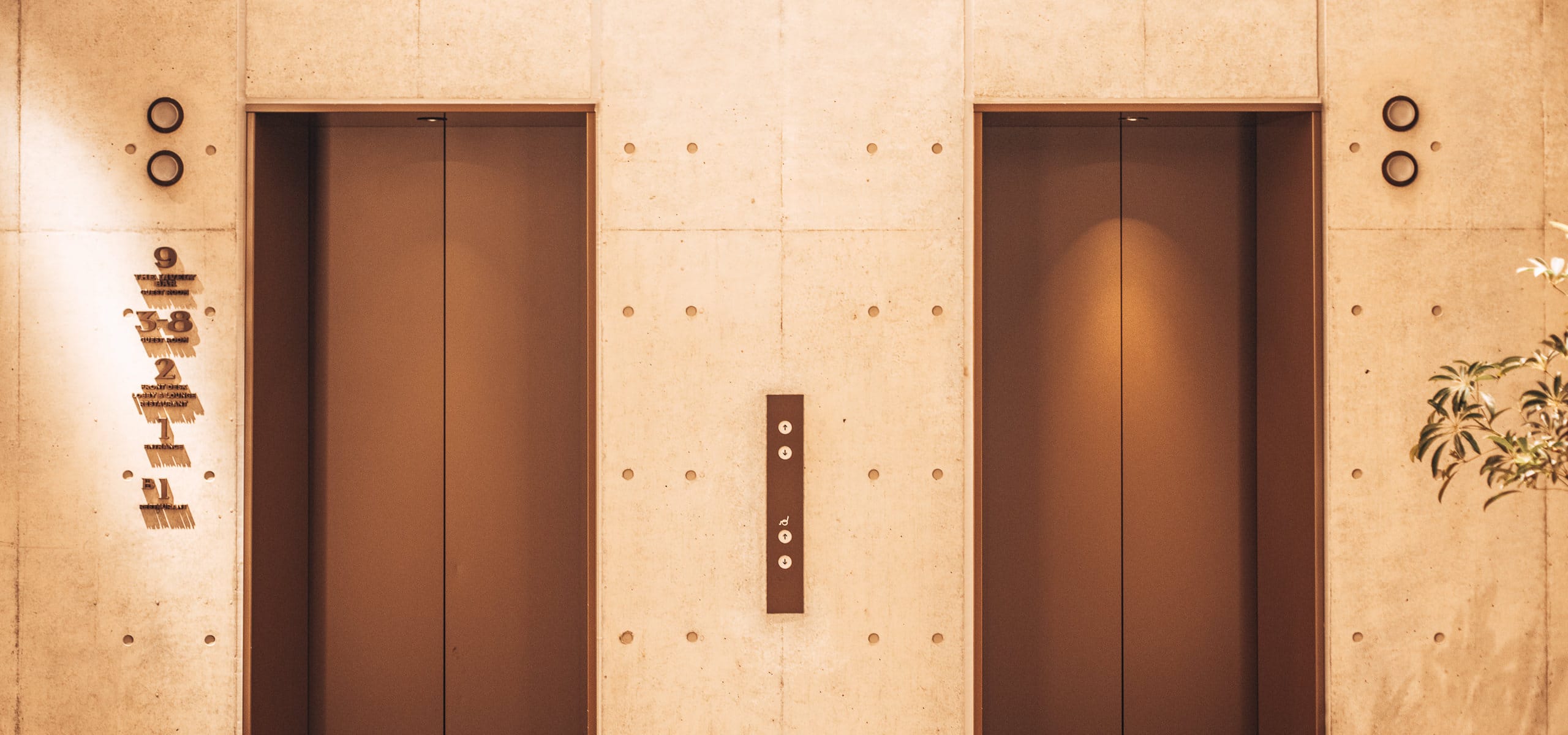 Hotel Review The Lively The brass elevator doors at reception at The Lively Azabujuban - Minato City Tokyo