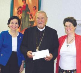 President Violet Robbat and Vice President Dianne O'Regan present check for 2012 project to His Eminence, Metropolitan Philip