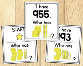Three cards from an I Have, Who Has...? game - showing place value blocks up to 1000.