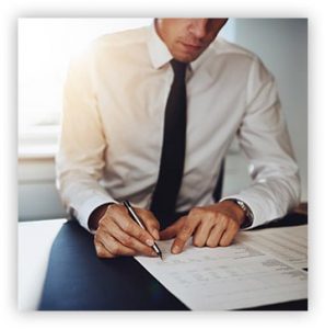 law_pic_1 man reviewing legal answering service documents