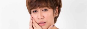 Woman suffering from bruxism