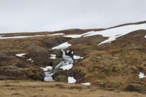 Snow melting in May in Iceland