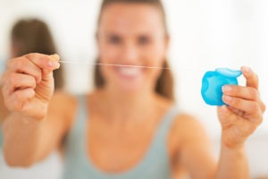 flossing your teeth