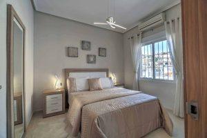 real estate photograph of stylish bedroom