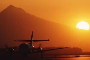picture of airplane on runway during sunset illustrating Aerospace spot welding applications