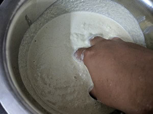 Mixing the Idli batter with hand aids good fermentation