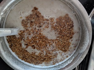 tempering of cumin seeds or jeera in sesame oil