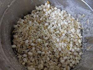 Grinding the soaked rice and lentils
