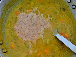 Add the coconut mix to the cooked vegetables and dal