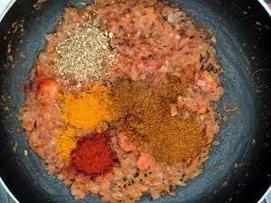 Adding spices for Chana Masala