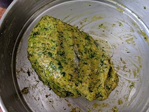 adding oil to the dough to prevent it from cracking and drying
