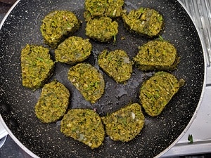 Pan frying the Kothimbir Vadi