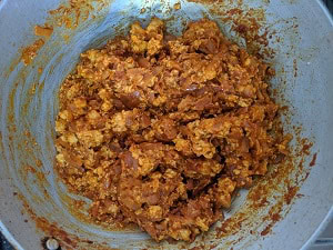 Allow the masala to mix with the paneer