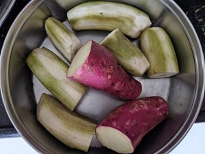 Pressure cook the raw banana and sweet potato