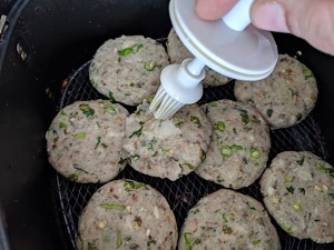 apply oil or spray oil on the cutlets before air frying