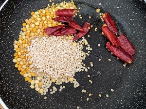 Urad Dal, Chana Dal and red chillies for thogayal