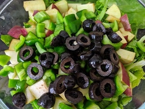 Chopped capsicum and black olives added along with the rest of the ingredients