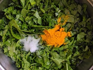 Turmeric Powder and salt added to the dal while pressure cooking