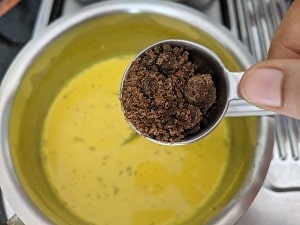 Palm Jaggery added to turmeric milk