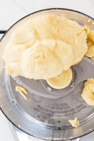 Pie crust dough ball in food processor