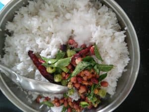 Tempering and salt added to warm Rice