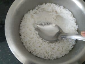 Mash the rice with a back of the spoon for soft texture