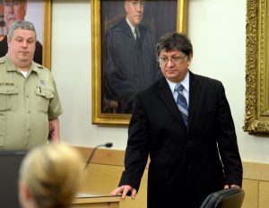 Bangor, ME -- April 27, 2015 -- Adam Metropoulos (right), 53, a former priest at St. George Greek Orthodox Church in Bangor, was sentenced Monday at the Penobscot Judicial Center to 12 years in prison with all but 6 1/2 years suspended for sex crimes involving children. Linda Coan O'Kresik | BDN